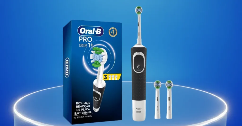 Escova elétrica Oral-B Pro Series 1+ com corpo preto e três refis posicionados ao lado da embalagem azul